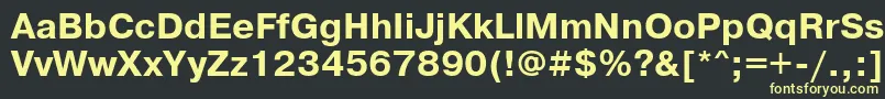 フォントPrg75Ac – 黒い背景に黄色の文字