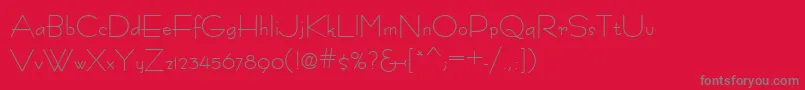 Fastracfashion-fontti – harmaat kirjasimet punaisella taustalla