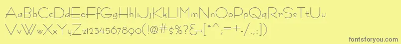 Fastracfashion-fontti – harmaat kirjasimet keltaisella taustalla