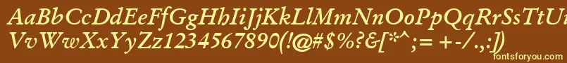 GaramondKursivHalbfett-fontti – keltaiset fontit ruskealla taustalla