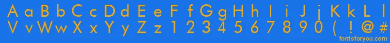 FuturistfixedwidthRegular Font – Orange Fonts on Blue Background