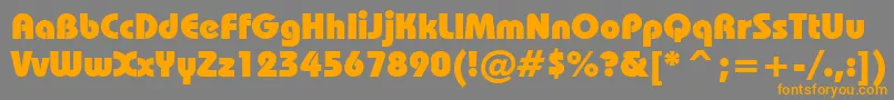 フォントBauhausHeavyBt – オレンジの文字は灰色の背景にあります。