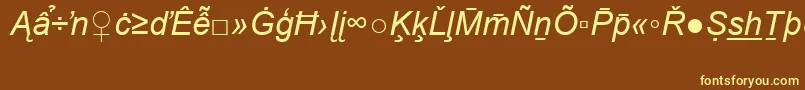 Czcionka ArialSpecialG2Italic – żółte czcionki na brązowym tle