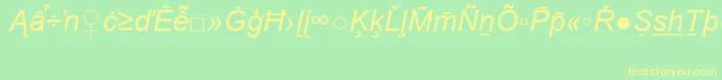 フォントArialSpecialG2Italic – 黄色の文字が緑の背景にあります