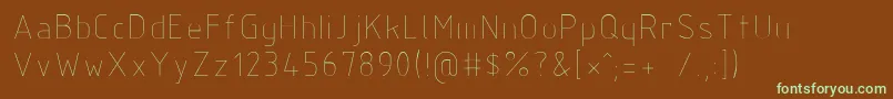 フォントIsocp2 – 緑色の文字が茶色の背景にあります。