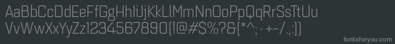 フォントQuarcanormbook – 黒い背景に灰色の文字