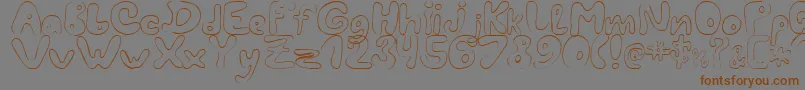 LcBlowzy-fontti – ruskeat fontit harmaalla taustalla