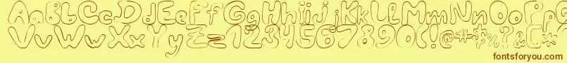LcBlowzy Font – Brown Fonts on Yellow Background