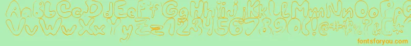 LcBlowzy-fontti – oranssit fontit vihreällä taustalla