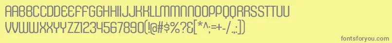 フォントKleptocracyTitlingLt – 黄色の背景に灰色の文字