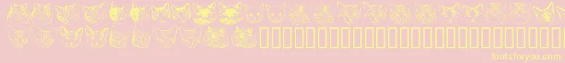 Kittyprint-Schriftart – Gelbe Schriften auf rosa Hintergrund