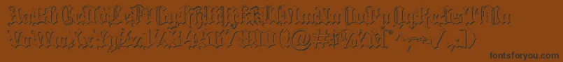 Blacklettersh-fontti – mustat fontit ruskealla taustalla