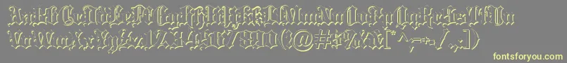 Blacklettersh Font – Yellow Fonts on Gray Background