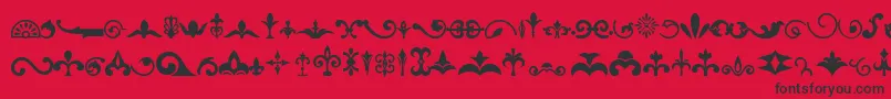 Fonte Ornaments – fontes pretas em um fundo vermelho
