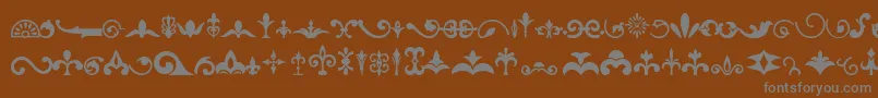 フォントOrnaments – 茶色の背景に灰色の文字