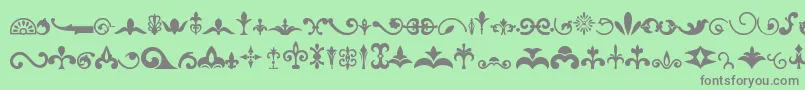 Ornaments-Schriftart – Graue Schriften auf grünem Hintergrund