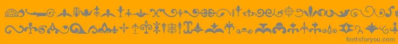 Czcionka Ornaments – szare czcionki na pomarańczowym tle