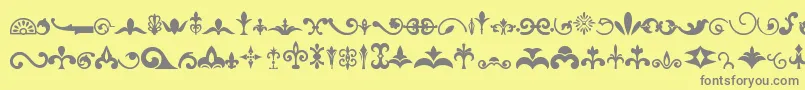 フォントOrnaments – 黄色の背景に灰色の文字