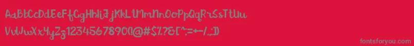 BrushAction-Schriftart – Graue Schriften auf rotem Hintergrund