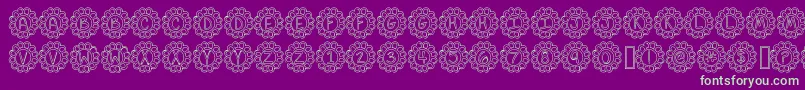 FlowerPowerHollow-Schriftart – Grüne Schriften auf violettem Hintergrund