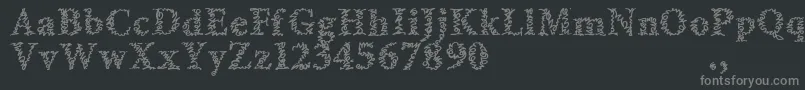 フォントAmltrial – 黒い背景に灰色の文字