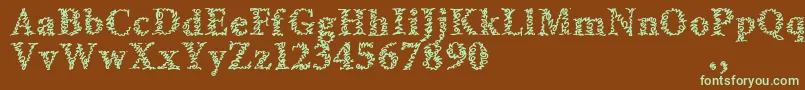 フォントAmltrial – 緑色の文字が茶色の背景にあります。