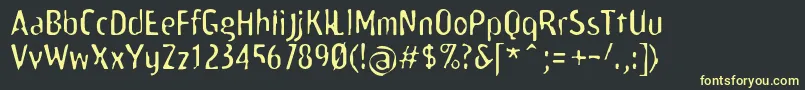 Scamofobiarainc Font – Yellow Fonts on Black Background