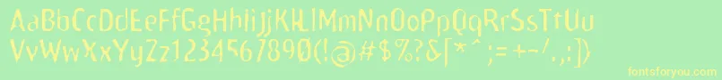 Scamofobiarainc Font – Yellow Fonts on Green Background