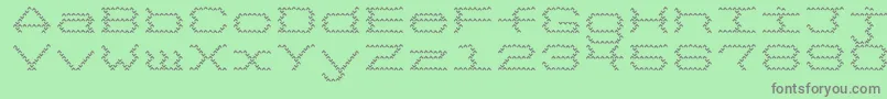 フォント3Megabytes – 緑の背景に灰色の文字