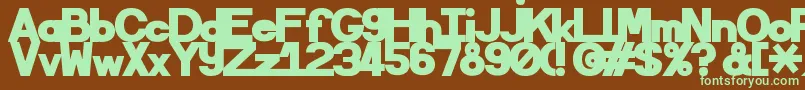 フォントSematary – 緑色の文字が茶色の背景にあります。