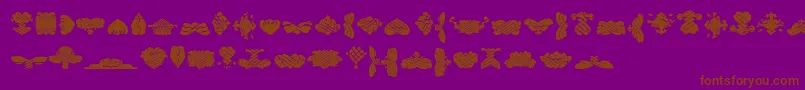 BlackOrnamentsFree-Schriftart – Braune Schriften auf violettem Hintergrund