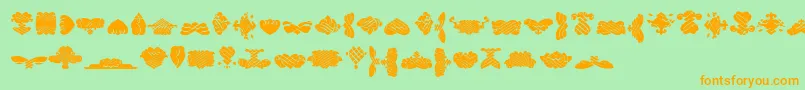 BlackOrnamentsFree-Schriftart – Orangefarbene Schriften auf grünem Hintergrund