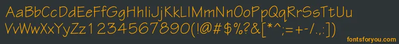 フォントEskiztwoc – 黒い背景にオレンジの文字