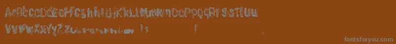 Шрифт WasteOfPaint – серые шрифты на коричневом фоне