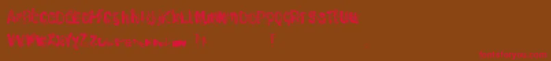 WasteOfPaint Font – Red Fonts on Brown Background