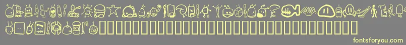 Tombots Font – Yellow Fonts on Gray Background