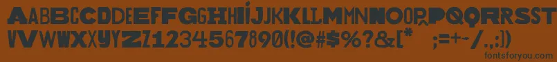 Bakuninregular Font – Black Fonts on Brown Background