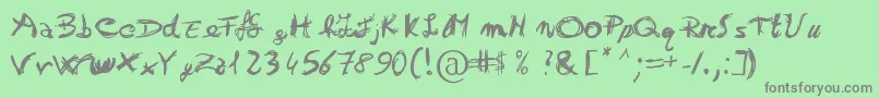 Otrack Font – Gray Fonts on Green Background