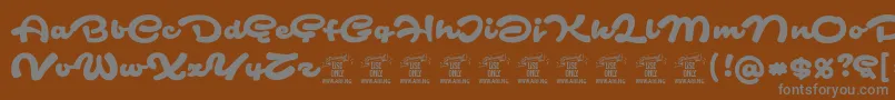 SafirscriptPersonalUse-Schriftart – Graue Schriften auf braunem Hintergrund