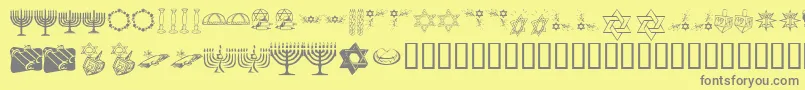 フォントKrHappyHanukhah – 黄色の背景に灰色の文字