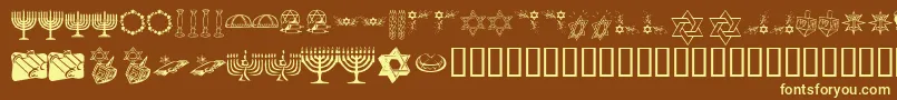 KrHappyHanukhah-Schriftart – Gelbe Schriften auf braunem Hintergrund