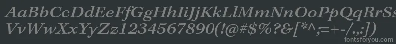 フォントKeplerstdMediumextitcapt – 黒い背景に灰色の文字
