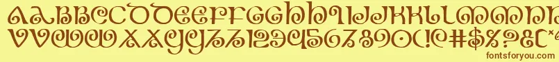 フォントTheshire – 茶色の文字が黄色の背景にあります。