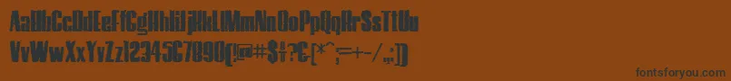 フォントHostilTrash – 黒い文字が茶色の背景にあります