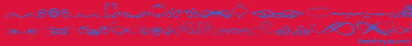 Czcionka AnotherOrnamentsTfb – niebieskie czcionki na czerwonym tle