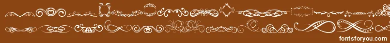 Fonte AnotherOrnamentsTfb – fontes brancas em um fundo marrom