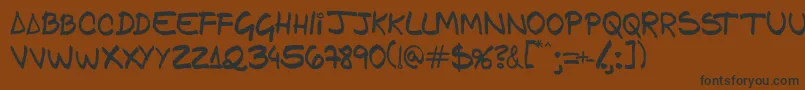 Gfamcomic Font – Black Fonts on Brown Background