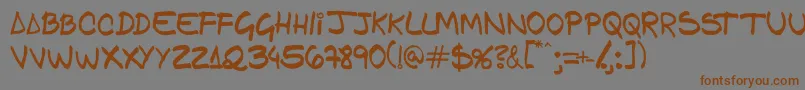 Gfamcomic Font – Brown Fonts on Gray Background