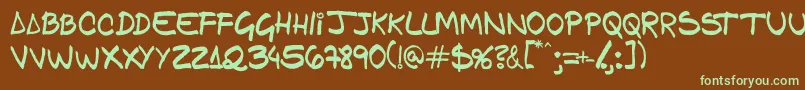 Gfamcomic-fontti – vihreät fontit ruskealla taustalla