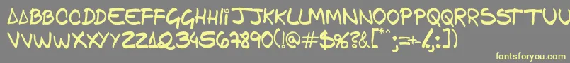Gfamcomic-fontti – keltaiset fontit harmaalla taustalla